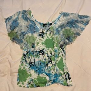 Blue, green, white top. Size XL, runs small.